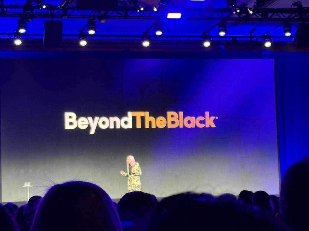 Presenter on stage at BlackLine Beyond the Black 2025 conference in Las Vegas